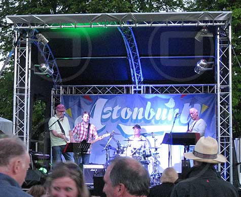 Small covered stage for summer music festival.
